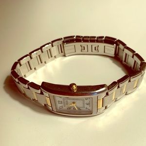 Coach watch. Silver with gold accent